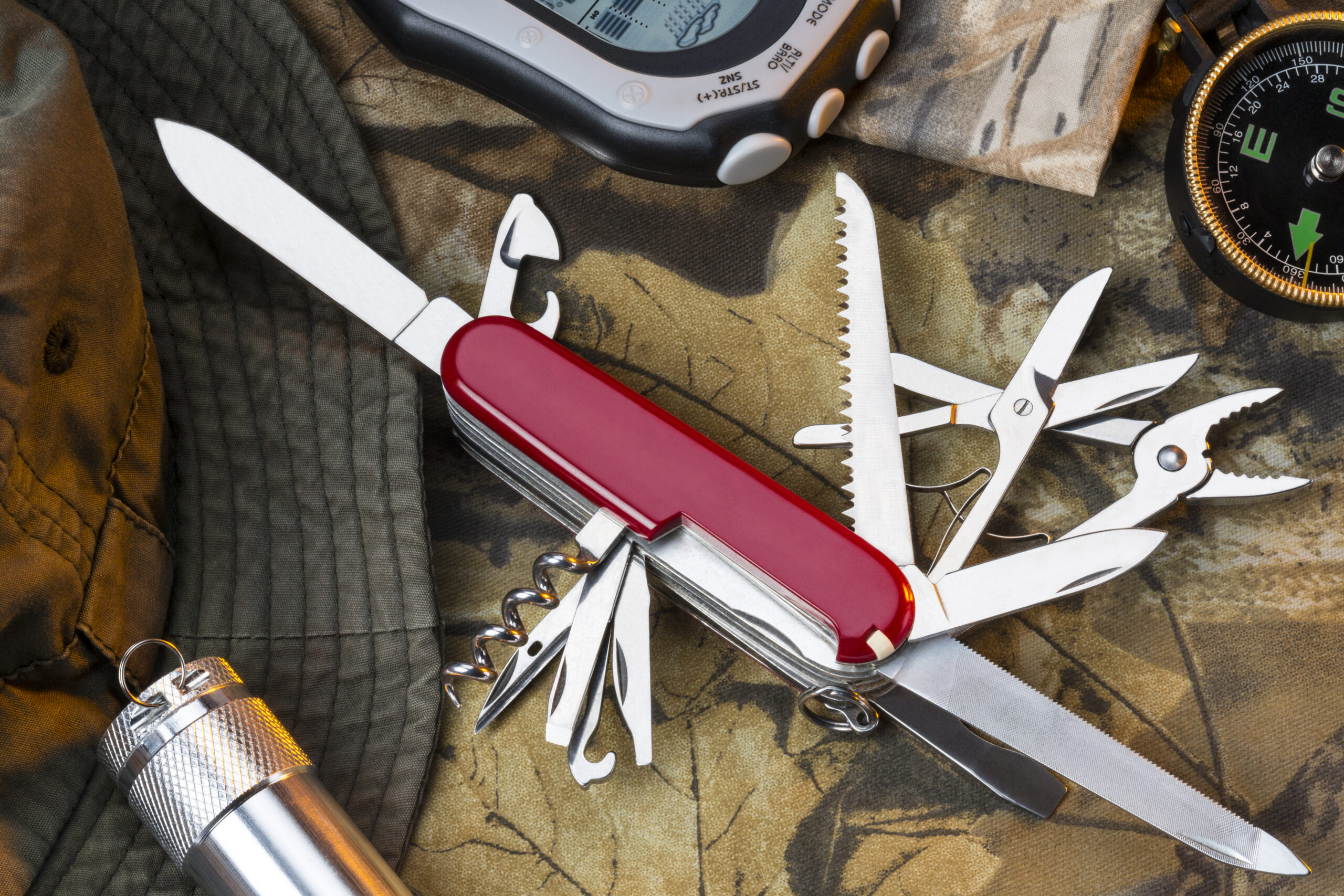 A Swiss Army style of mulitool knife and equipment for the great outdoors.